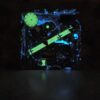 20261022_053908 Invaders shadow box, glowing green and blue, front glow in the dark view