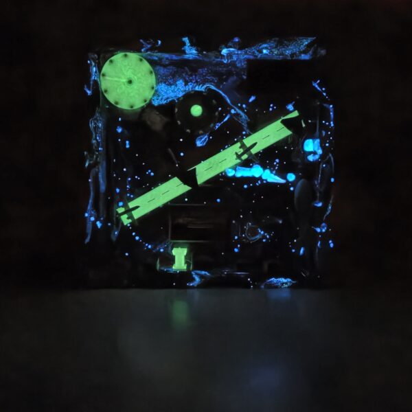 20261022_053908 Invaders shadow box, glowing green and blue, front glow in the dark view