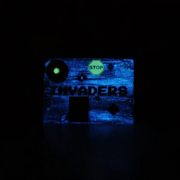 20261022_053927 Invaders canvas, glowing blue and green, front glow in the dark view
